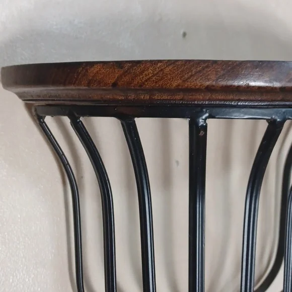 Beautiful accent shelf black worght iron basket dark wood shelf and bottom